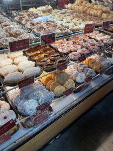 Rows of colorful donuts from Beiler's at the Reading Terminal Market.